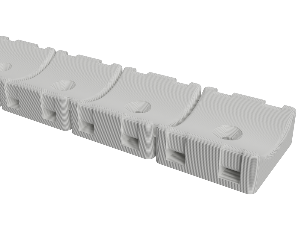 Close-up of the 1-1/8 inch hose mount strip showing the hose cradles and zip-tie slots