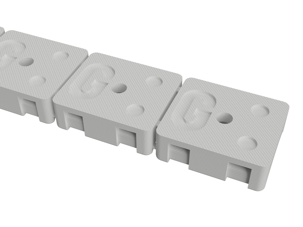 Underside of the 3/4 inch hose mount strip showing the adhesive pockets