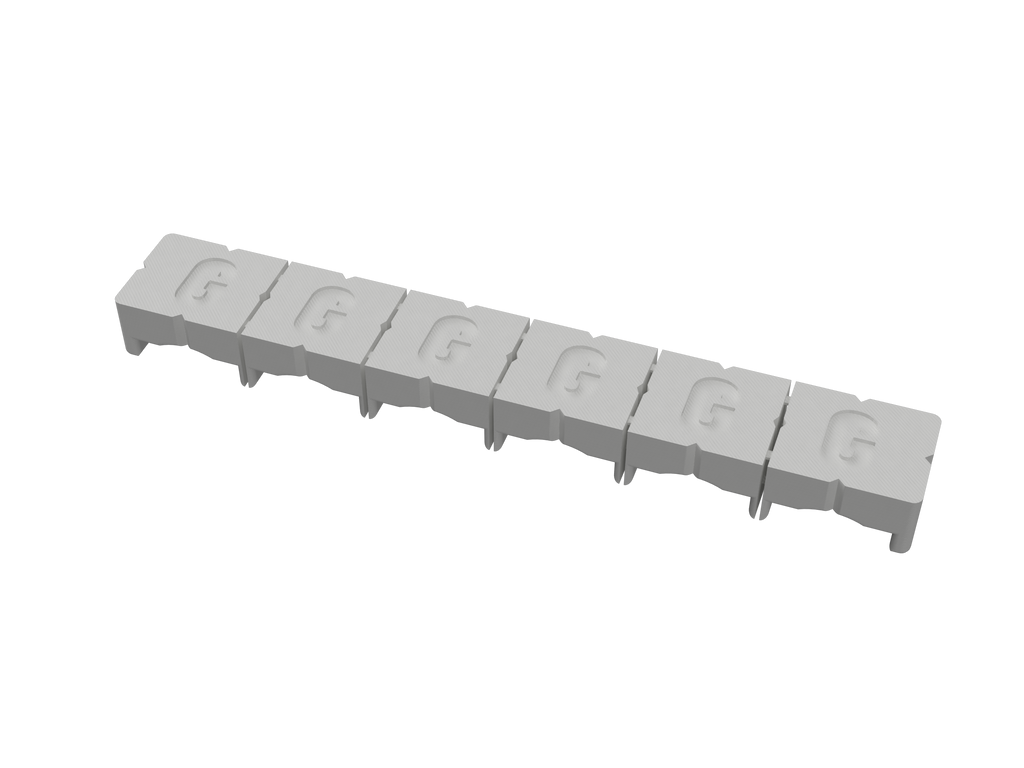 Underside of the 6-bay mount showing the recessed adhesive pockets